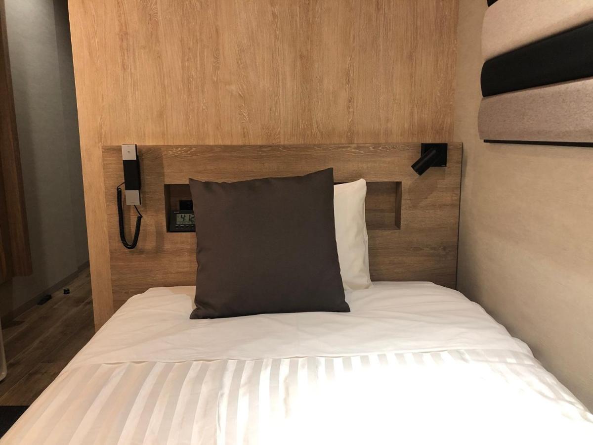 Kohoku Hotel สึชิอุระ ภายนอก รูปภาพ